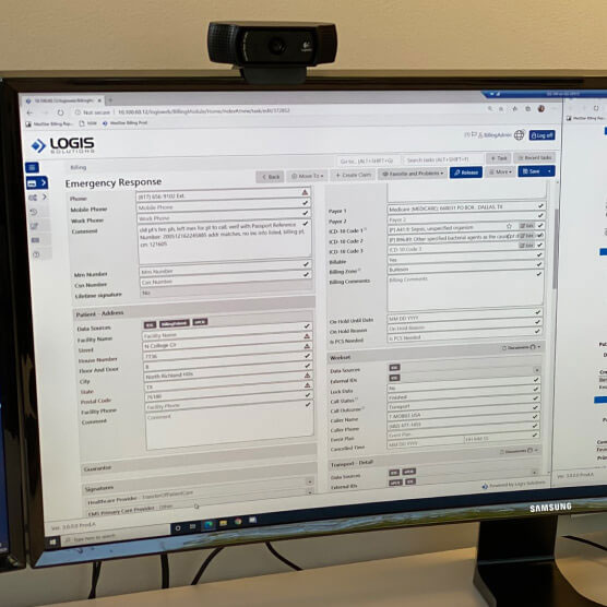 Computer showing Logis Solutions billing software form
